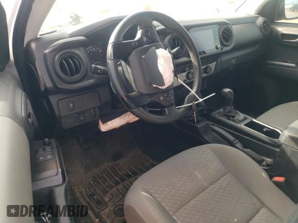 2023 Toyota Tacoma SR with VIN 3TYRX5GN2PT083718, listed as a Copart auction lot 49546035 with 23,005 mi miles and Salvage title. Bid and sale history available at DreamBid. Image 8.