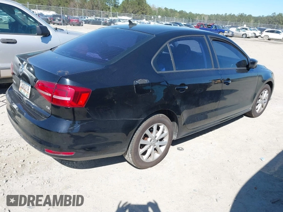 2015 Volkswagen Jetta SE with VIN 3VWD17AJ2FM351879, listed as a IAAI auction lot 41852426 with 108,900 mi miles and . Bid and sale history available at DreamBid. Image 4.