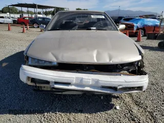 1992 Nissan Maxima z VIN JN1HJ01P6NT623546, wystawiony jako Copart lot #78095314 z przebiegiem 104 718 mil mil oraz Szkody całkowita. Historia ofert i sprzedaży dostępna na DreamBid. Obrazek 5.