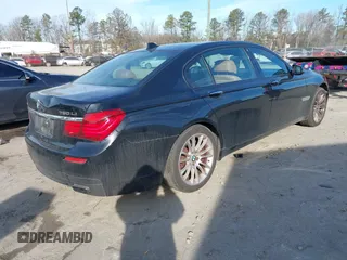 2015 BMW 7 Series 750Li xDrive with VIN WBAYF8C53FD655386, listed as a IAAI auction lot 41474678 with 122,160 mi miles and . Bid and sale history available at carsss.com. Image 4.