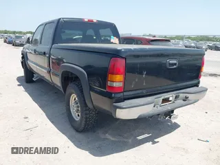 2003 GMC Sierra 1500HD SLE z VIN 1GTGK13U63F136146, wystawiony jako IAAI lot #42020608 z przebiegiem 170 466 mil mil oraz . Historia ofert i sprzedaży dostępna na DreamBid. Obrazek 3.