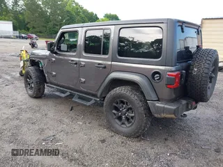 2021 Jeep Wrangler Unlimited Willys с VIN 1C4HJXDG2MW646904, выставлен на аукционе IAAI как лот 42267506 с пробегом 55 530 миль миль и . История ставок и продаж доступна на DreamBid. Изображение 3.