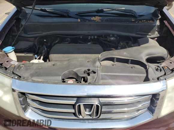 2012 Honda Pilot EX-L z VIN 5FNYF4H58CB080565, wystawiony jako Copart lot #54896635 z przebiegiem 203 725 mil mil oraz Szkoda całkowita • Salvage title. Historia ofert i sprzedaży dostępna na DreamBid. Obrazek 12.