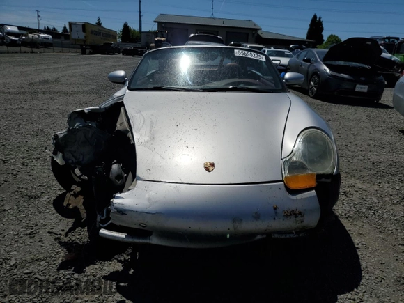 1998 Porsche Boxster z VIN WP0CA2986WU620657, wystawiony jako Copart lot #55595275 z przebiegiem 78 711 mil mil oraz Szkoda całkowita • Salvage title. Historia ofert i sprzedaży dostępna na DreamBid. Obrazek 5.