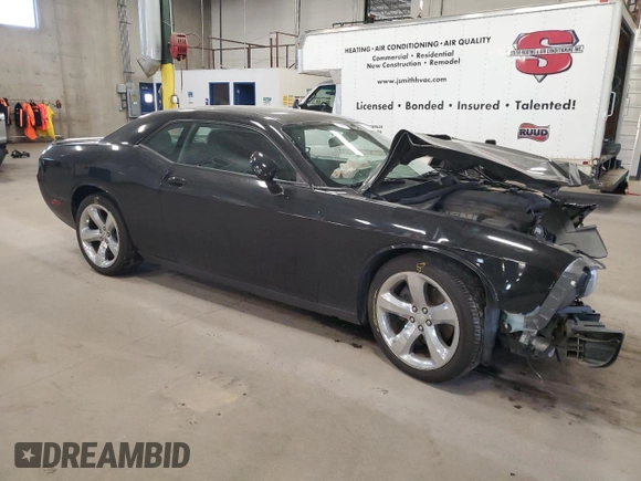 2013 Dodge Challenger R/T z VIN 2C3CDYBT9DH501059, wystawiony jako Copart lot #55139865 z przebiegiem 95 112 mil mil oraz Szkoda całkowita • Salvage title. Historia ofert i sprzedaży dostępna na DreamBid. Obrazek 4.