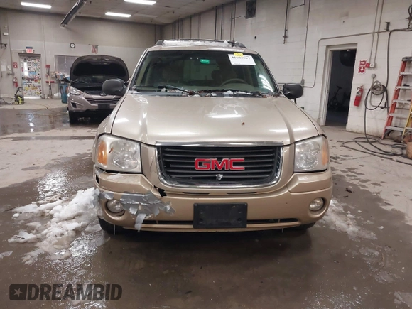 2004 GMC Envoy SLT with VIN 1GKET16S746148679, listed as a IAAI auction lot 41602991 with 196,621 mi miles and . Bid and sale history available at DreamBid. Image 13.