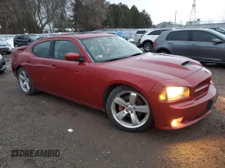 2006 Dodge Charger SRT-8 with VIN 2B3LA73W16H480803, listed as a Copart auction lot 84769274 with 110,243 mi miles and Salvage Title. Bid and sale history available at DreamBid. Image 4.