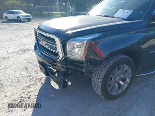2015 GMC Yukon XL SLT with VIN 1GKS1HKC0FR675450, listed as a IAAI auction lot 41558343 with 187,814 mi miles. Bid and sale history available at carsss.com. Image 6.