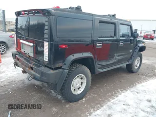 2003 Hummer H2 with VIN 5GRGN23UX3H106356, listed as a IAAI auction lot 41185603 with Not Provided miles. Bid and sale history available at carsss.com. Image 4.
