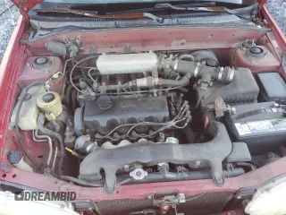 1997 Hyundai Accent z VIN KMHVF24N5VU369924, wystawiony jako Copart lot #85036114 z przebiegiem 168 797 mil mil oraz Szkody całkowita. Historia ofert i sprzedaży dostępna na DreamBid. Obrazek 11.