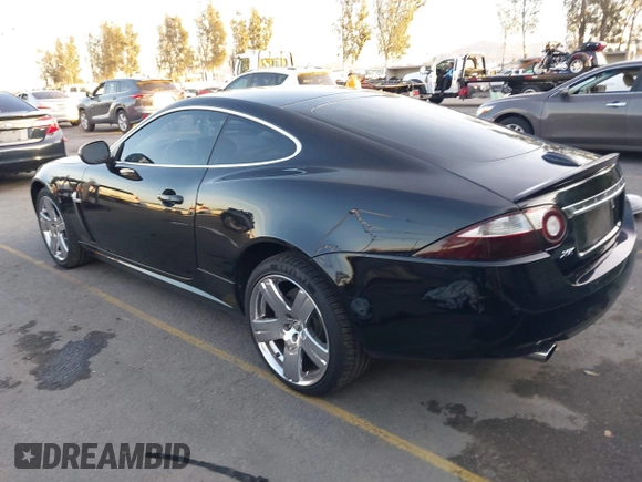 2008 Jaguar XK with VIN SAJWA43B985B23987, listed as a IAAI auction lot 41197091 with 54,803 mi miles. Bid and sale history available at carsss.com. Image 3.