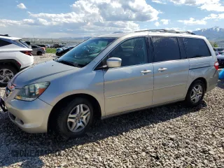 2007 Honda Odyssey EX-L z VIN 5FNRL38647B028078, wystawiony jako Copart lot #56208005 z przebiegiem 192 000 mil mil oraz Szkoda całkowita • Salvage title. Historia ofert i sprzedaży dostępna na DreamBid. Obrazek 1.