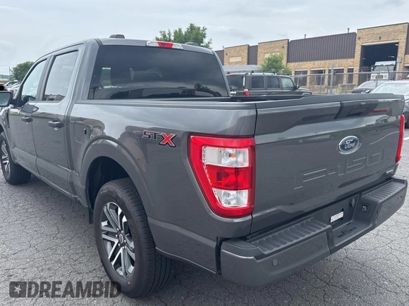 2023 Ford F-150 XL with VIN 1FTEW1CP4PKF54711, listed as a Copart auction lot 64622945 with 3,801 mi miles and Clean title. Bid and sale history available at DreamBid. Image 3.