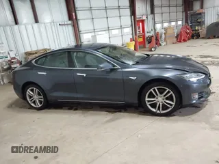 2014 Tesla Model S 60 with VIN 5YJSA1H16EFP52853, listed as a IAAI auction lot 41941989 with 132,038 mi miles and . Bid and sale history available at DreamBid. Image 13.