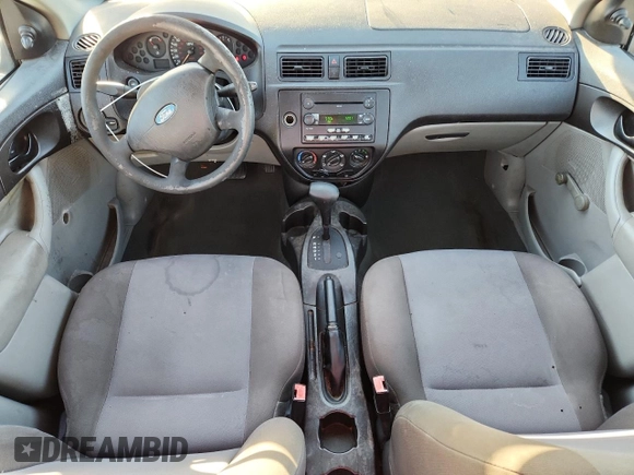 2007 Ford Focus S with VIN 1FAFP34N87W278008, listed as a Copart auction lot 61022545 with 139,575 mi miles and Salvage title. Bid and sale history available at DreamBid. Image 8.