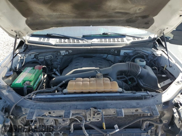2015 Ford F-150 XLT w/HD Payload Pkg with VIN 1FTFW1EG6FFA02457, listed as a Copart auction lot 52121515 with 242,747 mi miles and Salvage Title. Bid and sale history available at carsss.com. Image 12.