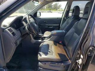 2004 Honda Pilot EX with VIN 2HKYF18664H574188, listed as a Copart auction lot 54102855 with 387,017 mi miles and Clean Title. Bid and sale history available at carsss.com. Image 7.
