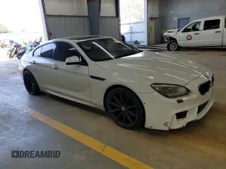 2015 BMW 6 Series 650i with VIN WBA6B2C5XFD799226, listed as a Copart auction lot 51317235 with 128,464 mi miles and Clean Title. Bid and sale history available at carsss.com. Image 4.