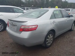 2007 Toyota Camry CE with VIN 4T1BE46K77U513111, listed as a IAAI auction lot 41561545 with 310,776 mi miles. Bid and sale history available at carsss.com. Image 4.