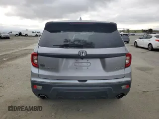 2021 Honda Passport EX-L с VIN 5FNYF8H5XMB026158, выставлен на аукционе Copart как лот 51530495 с пробегом 46 745 миль миль и На запчасти • Non repairable. История ставок и продаж доступна на DreamBid. Изображение 6.