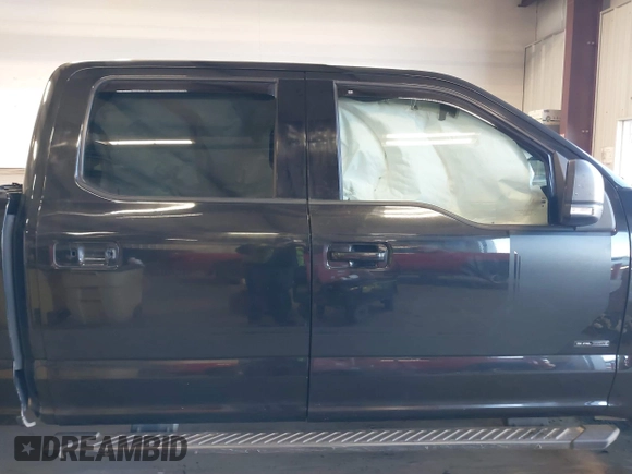2015 Ford F-150 XLT with VIN 1FTFW1EF3FKD51350, listed as a IAAI auction lot 41413942 with 125,877 mi miles and . Bid and sale history available at carsss.com. Image 14.
