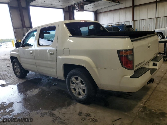 2006 Honda Ridgeline RTL with VIN 2HJYK16516H557411, listed as a Copart auction lot 71973254 with 251,596 mi miles and Salvage Title. Bid and sale history available at carsss.com. Image 2.
