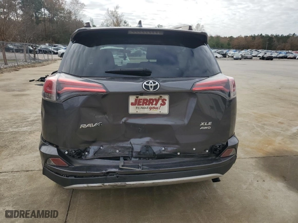 2016 Toyota RAV4 XLE with VIN JTMRFREV0GJ060556, listed as a Copart auction lot 84883774 with 85,486 mi miles and Salvage Title. Bid and sale history available at carsss.com. Image 6.