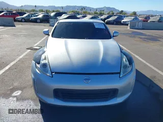 2014 Nissan 370Z Nismo with VIN JN1AZ4EHXEM634418, listed as a IAAI auction lot 41308580 with 84,074 mi miles and . Bid and sale history available at DreamBid. Image 12.