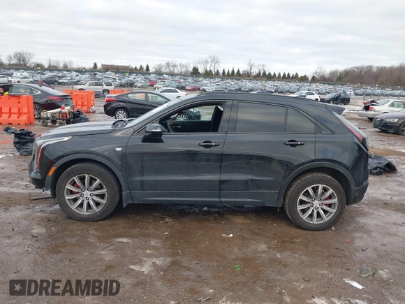 2021 Cadillac XT4 AWD Sport with VIN 1GYFZFR49MF065225, listed as a IAAI auction lot 41191994 with 58,095 mi miles and . Bid and sale history available at DreamBid. Image 14.