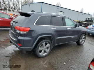 2015 Jeep Grand Cherokee Limited with VIN 1C4RJFBG9FC853828, listed as a Copart auction lot 48600395 with 123,699 mi miles and Salvage Title. Bid and sale history available at carsss.com. Image 3.