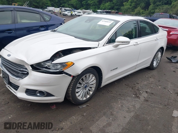 2013 Ford Fusion SE Hybrid with VIN 3FA6P0LU0DR128688, listed as a IAAI auction lot 42580852 with 137,421 mi miles and . Bid and sale history available at DreamBid. Image 2.