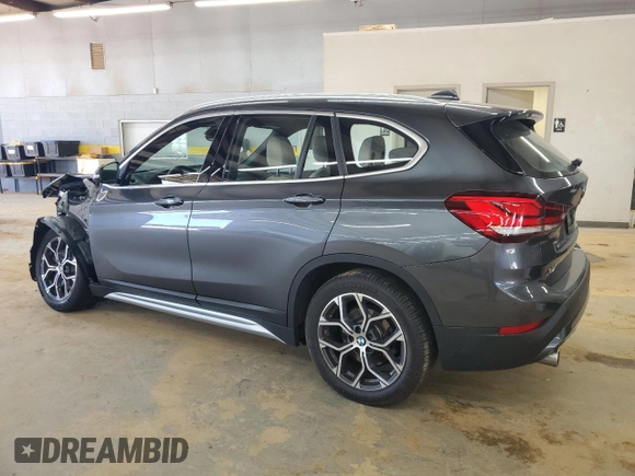 2021 BMW X1 xDrive28i with VIN WBXJG9C00M5S35249, listed as a Copart auction lot 61895775 with 34,641 mi miles and Salvage title. Bid and sale history available at DreamBid. Image 2.