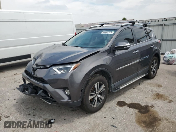 2016 Toyota RAV4 XLE with VIN 2T3RFREV0GW412875, listed as a Copart auction lot 59497545 with 226,604 mi miles and Salvage title. Bid and sale history available at DreamBid. Image 1.