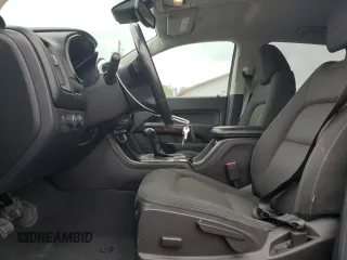 2019 GMC Canyon 4WD SLE z VIN 1GTG6CEN1K1206640, wystawiony jako Copart lot #55339285 z przebiegiem 52 166 mil mil oraz Szkody całkowita. Historia ofert i sprzedaży dostępna na DreamBid. Obrazek 7.