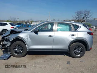 2019 Mazda CX-5 Sport with VIN JM3KFBBM7K0668830, listed as a IAAI auction lot 42069505 with Not Provided miles and . Bid and sale history available at DreamBid. Image 13.