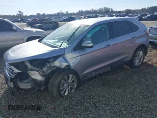 2022 Ford Edge Titanium z VIN 2FMPK4K95NBA38997, wystawiony jako IAAI lot #41467300 z przebiegiem 74 310 mil mil oraz . Historia ofert i sprzedaży dostępna na DreamBid. Obrazek 2.