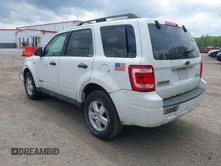 2008 Ford Escape Hybrid with VIN 1FMCU59H38KC38282, listed as a IAAI auction lot 42136889 with 233,123 mi miles. Bid and sale history available at carsss.com. Image 3.