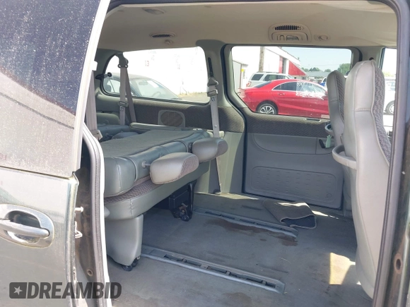 2000 Dodge Grand Caravan with VIN 1B4GT44L4YB583087, listed as a IAAI auction lot 42081647 with Not Provided miles and . Bid and sale history available at DreamBid. Image 8.