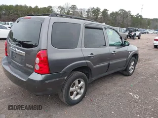 2006 Mazda Tribute S with VIN 4F2YZ04196KM12510, listed as a IAAI auction lot 41382627 with 242,650 mi miles and . Bid and sale history available at DreamBid. Image 4.