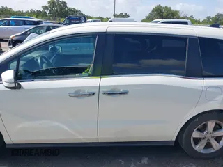 2018 Honda Odyssey EX with VIN 5FNRL6H57JB100035, listed as a IAAI auction lot 42582758 with 88,585 mi miles and . Bid and sale history available at DreamBid. Image 15.