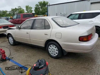 1995 Toyota Camry LE with VIN 4T1SK12E8SU548790, listed as a Copart auction lot 59390925 with 207,392 mi miles and Salvage title. Bid and sale history available at DreamBid. Image 2.