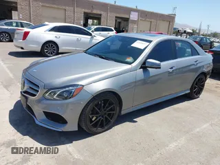 2014 Mercedes-Benz E 350 Sport with VIN WDDHF5KB5EB000039, listed as a IAAI auction lot 42345657 with 95,857 mi miles and . Bid and sale history available at DreamBid. Image 2.