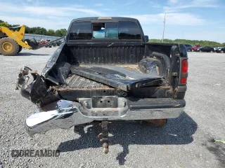 2000 Dodge Ram 2500 with VIN 3B7KF2364YG141972, listed as a Copart auction lot 70001534 with 184,140 mi miles and Salvage Title. Bid and sale history available at carsss.com. Image 6.