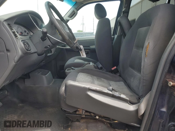 2005 Ford Explorer Sport Trac XLS with VIN 1FMDU67K95UB80915, listed as a Copart auction lot 54672085 with 182,683 mi miles and Salvage title. Bid and sale history available at DreamBid. Image 7.