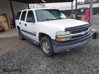 2003 Chevrolet Tahoe LT with VIN 1GNEC13Z63J126611, listed as a IAAI auction lot 41300437 with 313,885 mi miles. Bid and sale history available at carsss.com. Image 1.