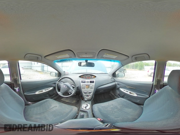 2007 Toyota Yaris with VIN JTDBT923071139724, listed as a Copart auction lot 51809545 with 220,598 mi miles and Salvage Title. Bid and sale history available at DreamBid. Image 12.
