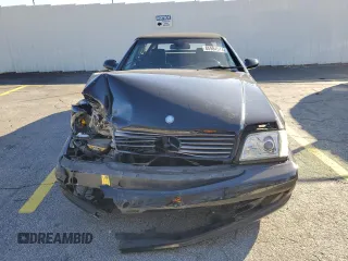 1999 Mercedes-Benz SL-Class with VIN WDBFA68F0XF175888, listed as a Copart auction lot 85984514 with 97,975 mi miles and Salvage Title. Bid and sale history available at carsss.com. Image 5.
