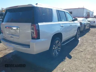 2018 GMC Yukon Denali with VIN 1GKS1CKJ2JR397760, listed as a IAAI auction lot 40653383 with 110,841 mi miles. Bid and sale history available at carsss.com. Image 4.