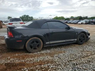 2003 Ford Mustang Deluxe z VIN 1FAFP44433F364091, wystawiony jako Copart lot #54061935 z przebiegiem 201 406 mil mil oraz Szkoda całkowita • Salvage title. Historia ofert i sprzedaży dostępna na DreamBid. Obrazek 3.