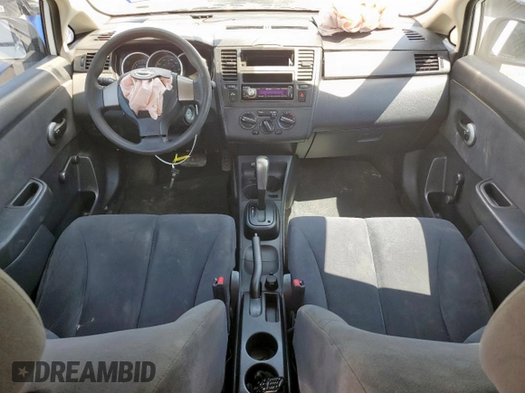 2010 Nissan Versa 1.6 with VIN 3N1CC1AP5AL403629, listed as a Copart auction lot 58264865 with 86,399 mi miles and Salvage title. Bid and sale history available at DreamBid. Image 8.